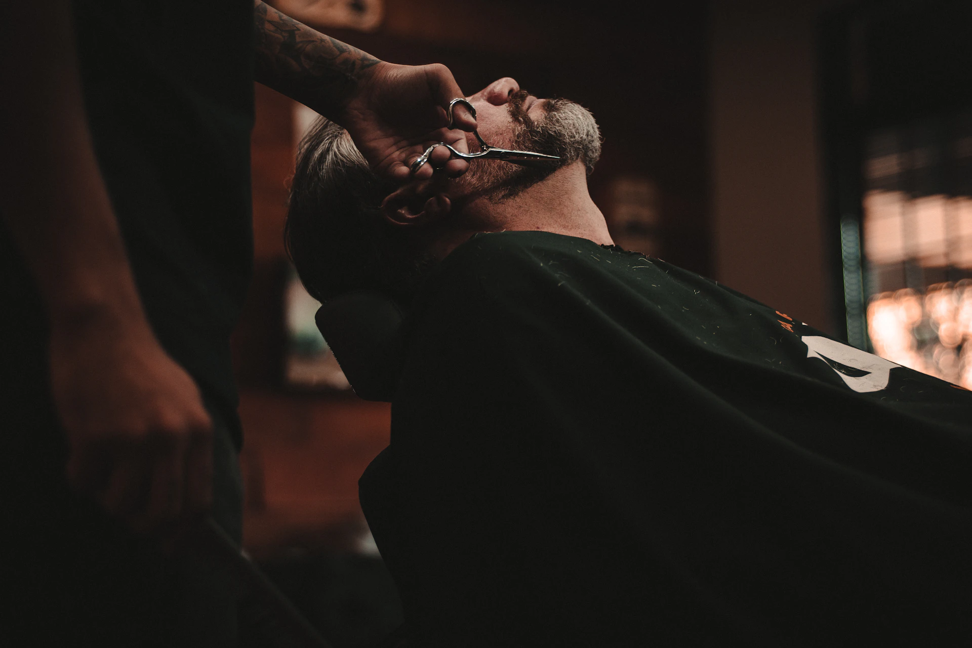 GE Barbershop atelier interior — chairs, wood, and calm light